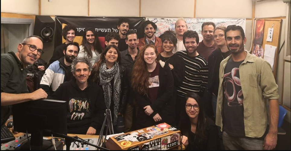 The KZradio volunteer team gathered in the studio